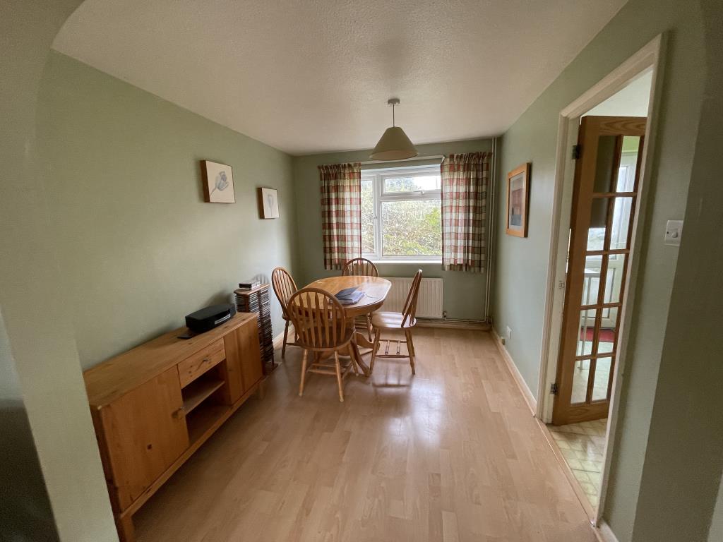 Lot: 78 - SEMI-DETACHED HOUSE IN POPULAR VILLAGE - Inside image of dining area from living area